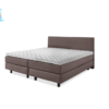 bruin bed 180x200 cm met gestofeerde matrassen en een wit topmatras